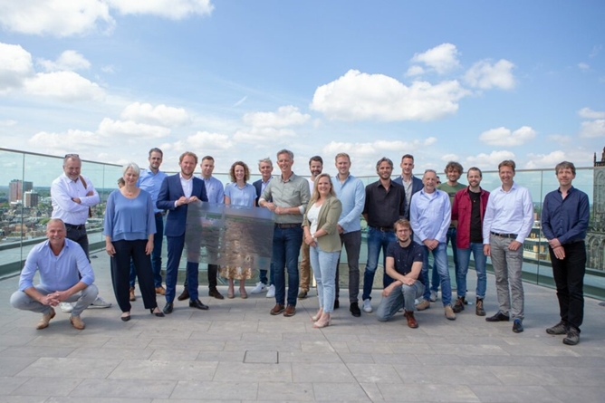 Groep medewerkers op het dak van Forum